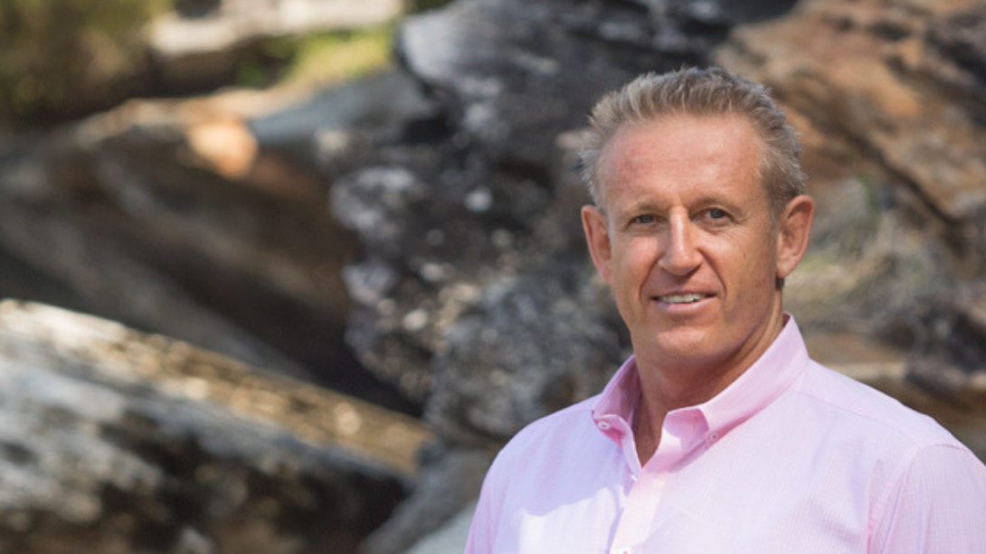 Phil Adair reviewing financial charts or investment graphs